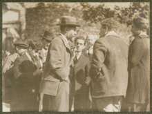 Max Weber, facing right, lecturing with Ernst Toller in the center of the background